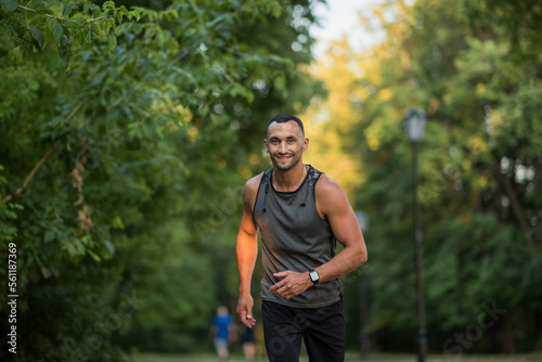  young handsome man is engaged in jogging on the street in sportswear, sports lifestyle, jogging on the street.