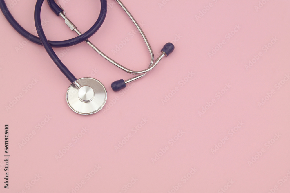 Stethoscope on pink background. Large copy space for text. Medicine and health care concept. Stethoscope on pink background. Large copy space for text. Medicine and health care concept.