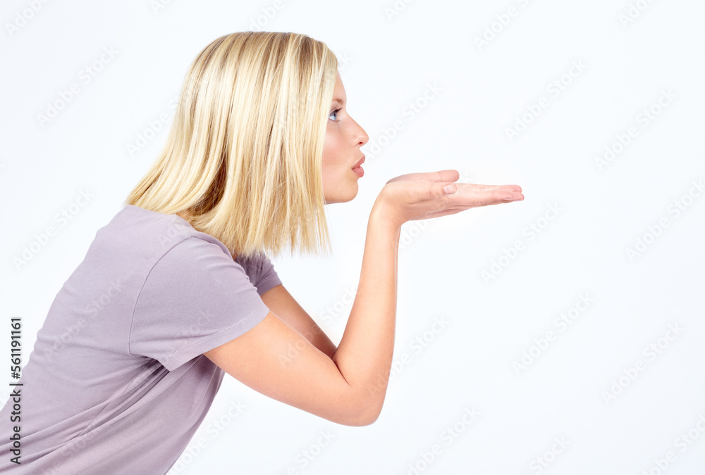 Flirting profile and air kiss of girl contemplating, thinking and thoughtful for advertising. Attractive flirt and affection of isolated model blowing kisses on white background mock up. Flirting profile and air kiss of girl contemplating, thinking and thoughtful for advertising. Attractive flirt and affection of isolated model blowing kisses on white background mock up.