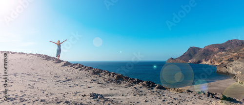 Happy woman at Playa Monsul,  Almeria province in Spain- Andalusia