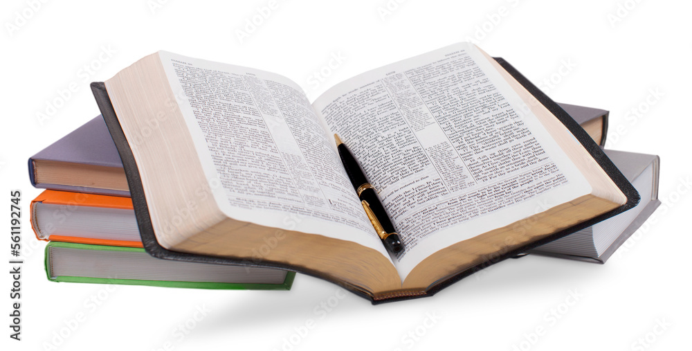 Obraz premium Opened Book on stack books With Pen