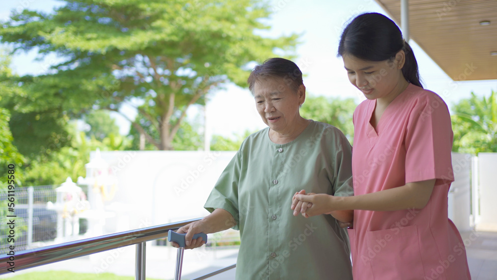 Old elderly Asian patient or pensioner people walking, relaxing, in nursing home in garden park. Senior lifestyle activity recreation. Retirement. Health care physical therapy. Old elderly Asian patient or pensioner people walking, relaxing, in nursing home in garden park. Senior lifestyle activity recreation. Retirement. Health care physical therapy.