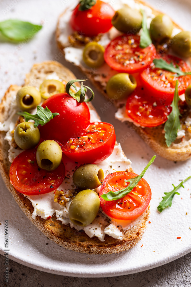 Appetizer with bruschetta with tomatoes and olives Appetizer with bruschetta with tomatoes and olives