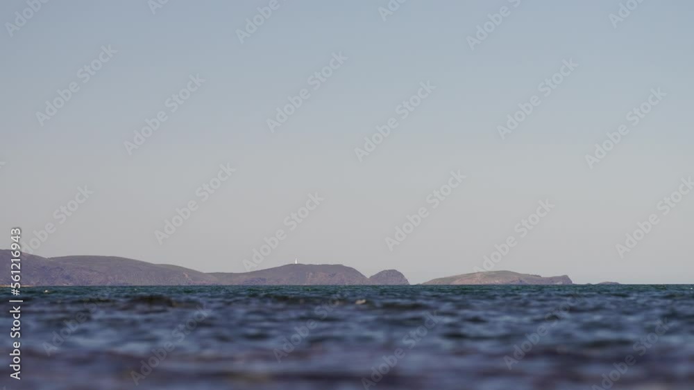 Tropical island in the Great Barrier Reef. coral reef, with yachts sailing. Boats and super yachts on holiday. Voyages travelling on the ocean Tropical island in the Great Barrier Reef. coral reef, with yachts sailing. Boats and super yachts on holiday. Voyages travelling on the ocean