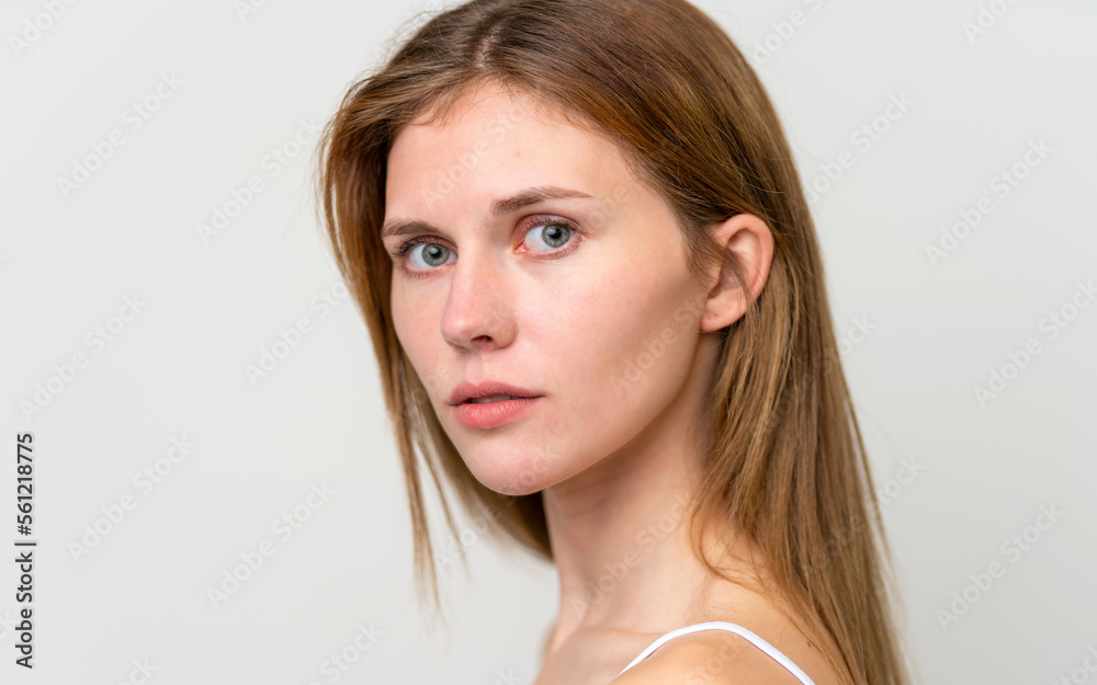 Portrait of pretty young woman over isolated white background Portrait of pretty young woman over isolated white background