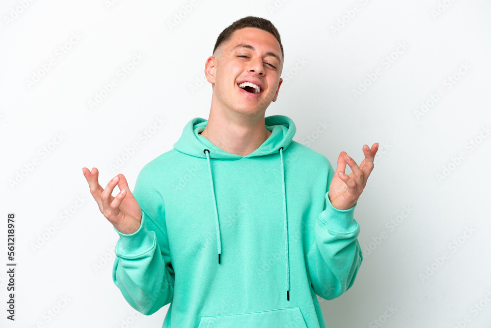 Young brazilian man isolated on white background smiling a lot Young brazilian man isolated on white background smiling a lot