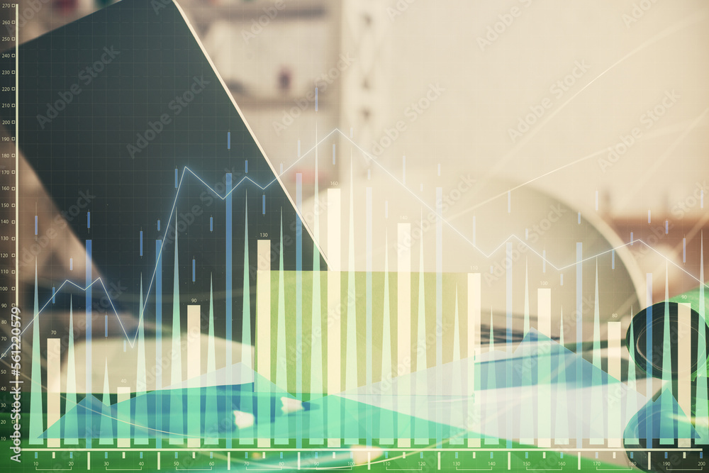 Forex market graph hologram and personal computer on background. Multi exposure. Concept of investment. Forex market graph hologram and personal computer on background. Multi exposure. Concept of investment.