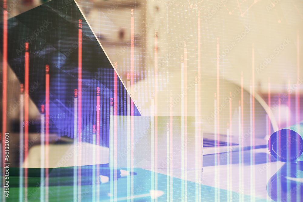 Forex market graph hologram and personal computer on background. Double exposure. Concept of investment. Forex market graph hologram and personal computer on background. Double exposure. Concept of investment.