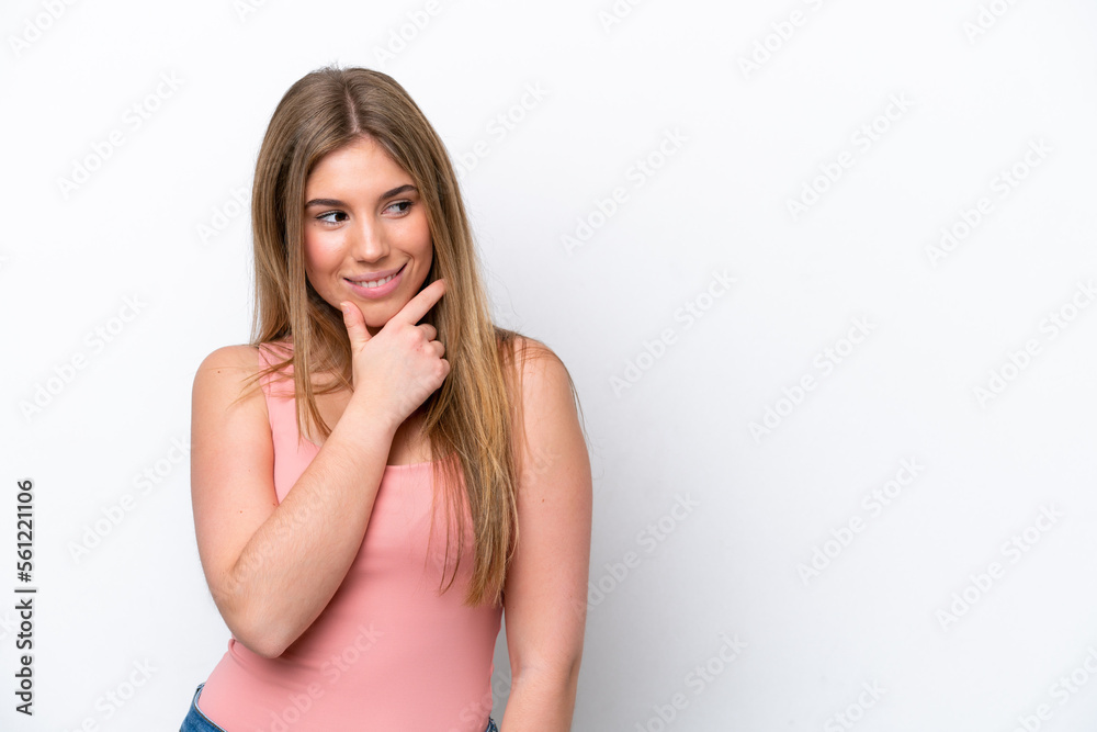 Young caucasian woman isolated on white bakcground looking to the side and smiling Young caucasian woman isolated on white bakcground looking to the side and smiling