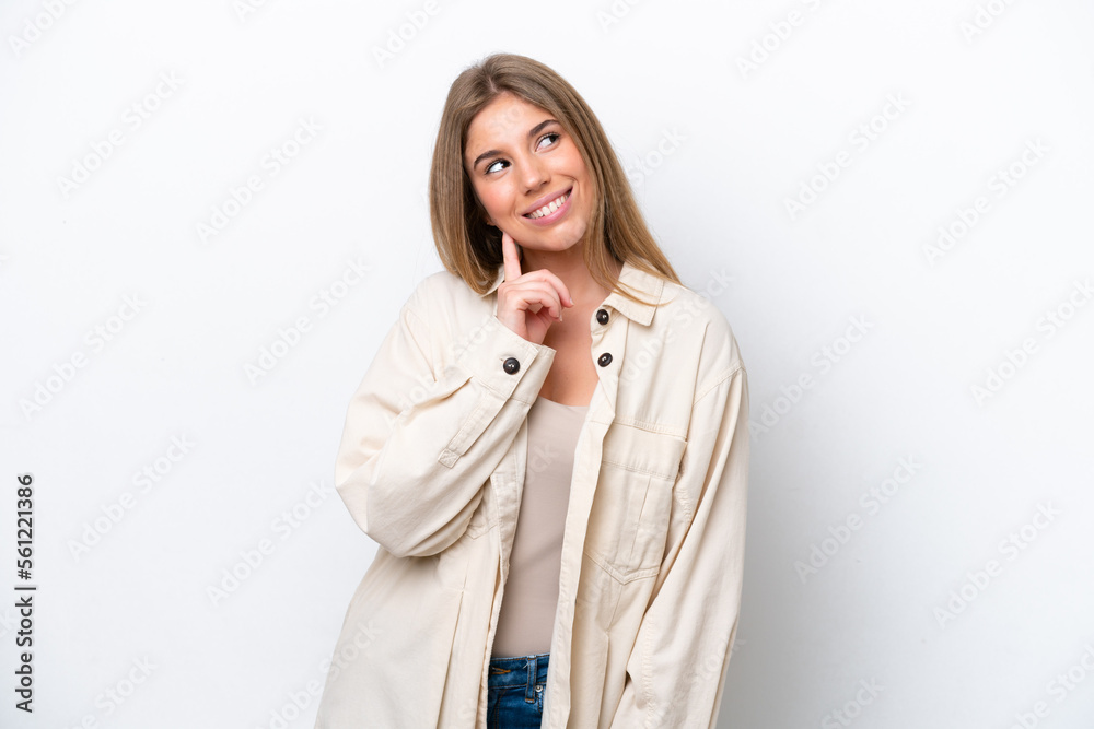 Young caucasian woman isolated on white bakcground thinking an idea while looking up Young caucasian woman isolated on white bakcground thinking an idea while looking up