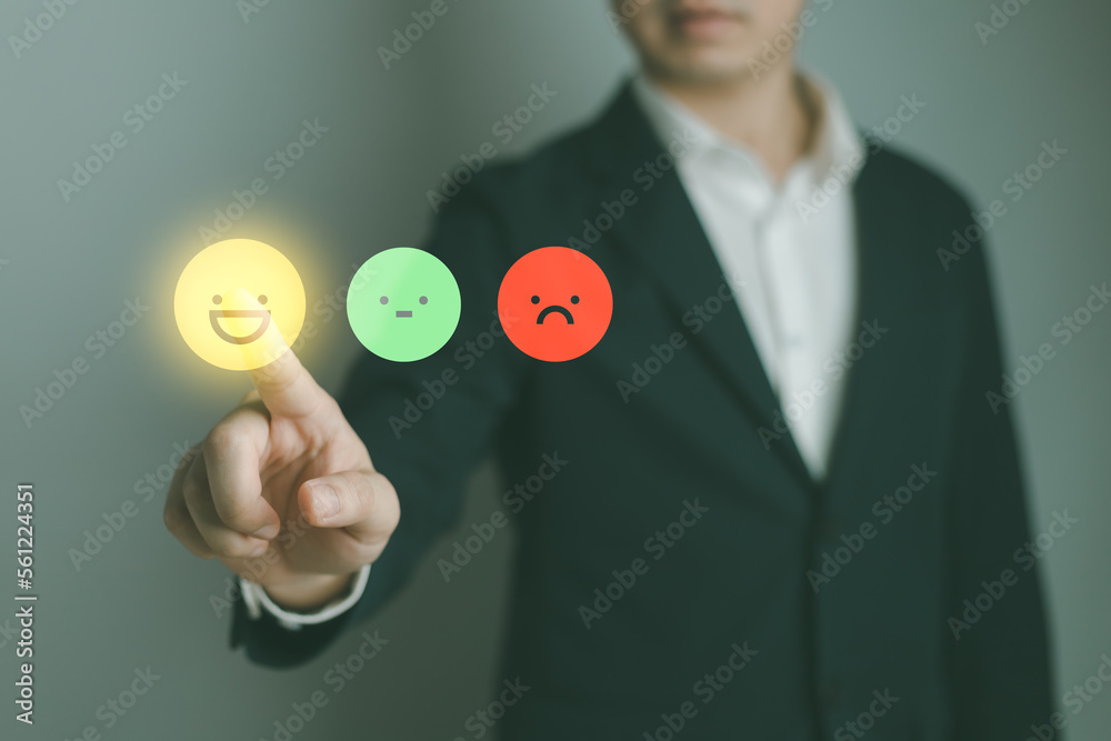 User give rating to service experience on online application for Customer review satisfaction feedback survey concept. User give rating to service experience on online application for Customer review satisfaction feedback survey concept.