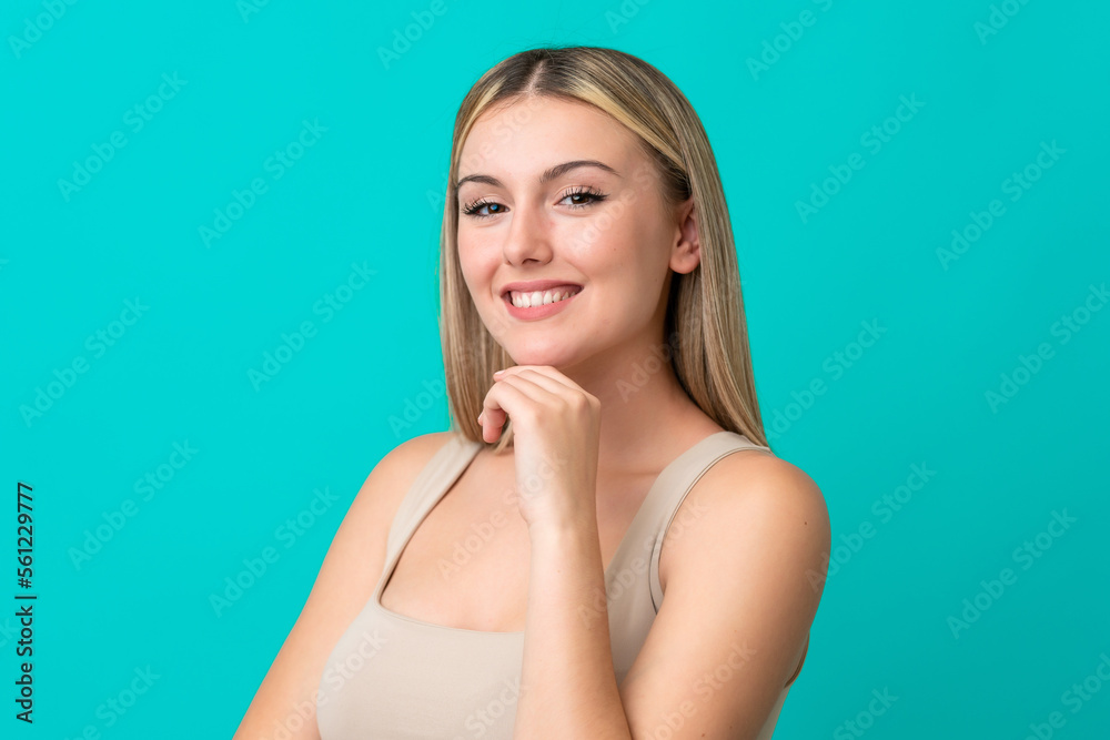Portrait of pretty young woman over blue isolated background Portrait of pretty young woman over blue isolated background