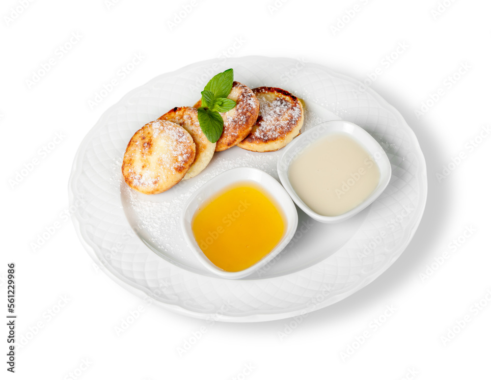 Cheese pancake with sauce cream on plate Cheese pancake with sauce cream on plate