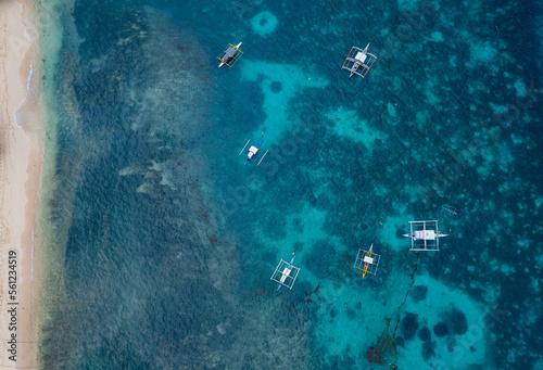 Beach coral reef and catamarans on Siargao island  Philippines  seen from above  drone photo