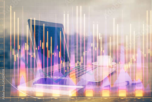 Forex market graph hologram and personal computer on background. Multi exposure. Concept of investment. © peshkova