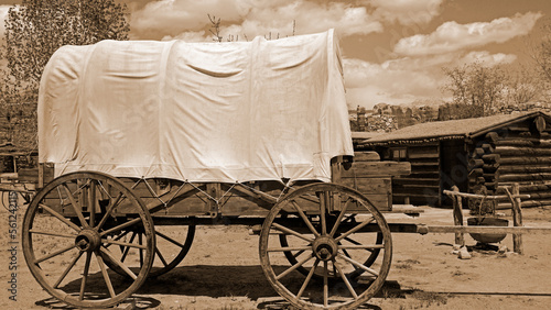 Simulated old photograph of wagons on the Oregon trail	 photo