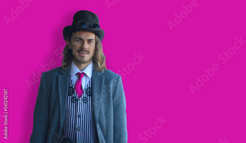 Obraz na płótnie LGBTQ man in suit on pink background w salonie
