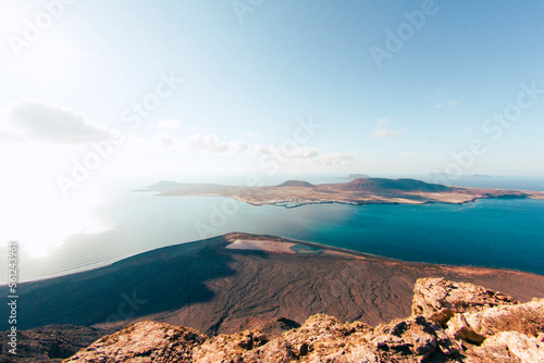 Scenic view of Lanzarote island against sky photo