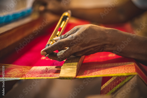 Knchipuram handloom weaver hand crafted closeup shot. The Kanchipuram silk sari is a type of silk sari made in the Kanchipuram region in Tamil Nadu, India.