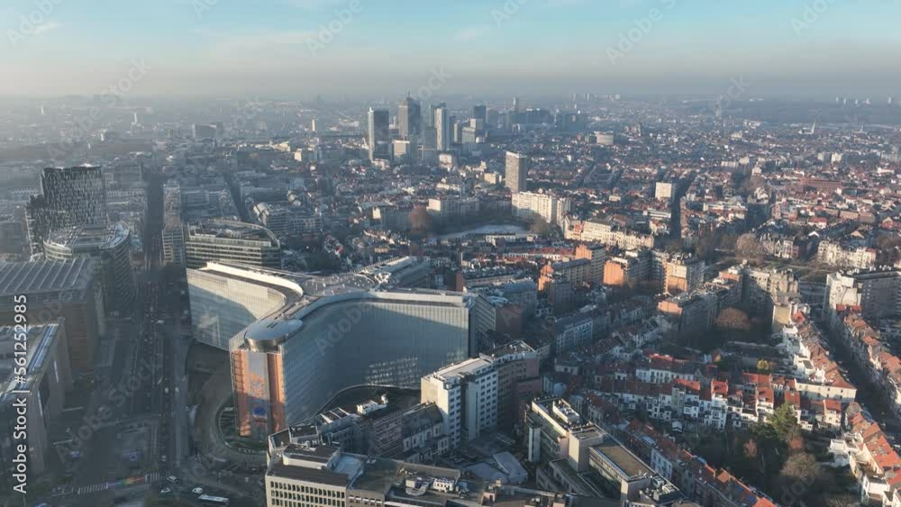 Skyline of Brussels, Belgium. Europe. Urban city overhead aerial drone view. Infrastructure, office buildings, real estate housing. Sunny winter day. City park of capital of Belgium.