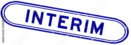 Grunge blue interim word rubber seal stamp on white background