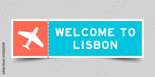 Orange and blue color ticket with plane icon and word welcome to lisbon on gray background