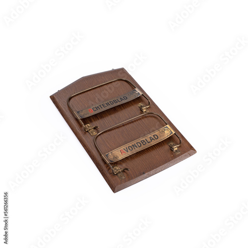 Vintage magazine or document holder isolated on white background photo