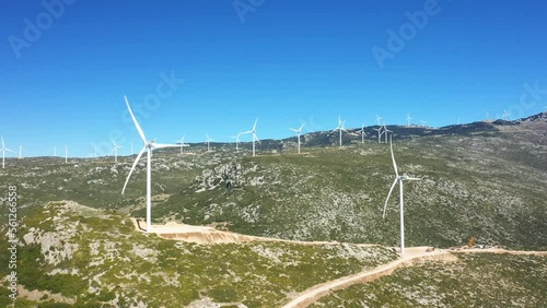 A wind farm in Europe, central Greece, towards Thisbe, in summer, on a sunny day. photo