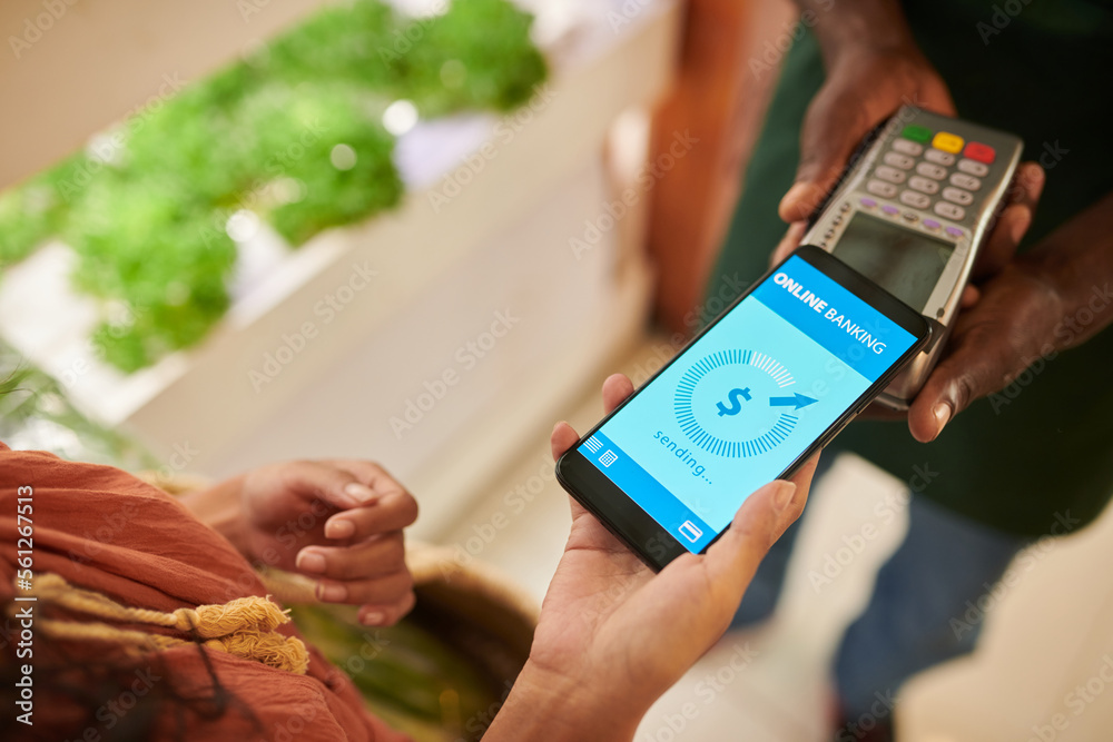 Closeup image of customer paying for purchases with mobile application Closeup image of customer paying for purchases with mobile application