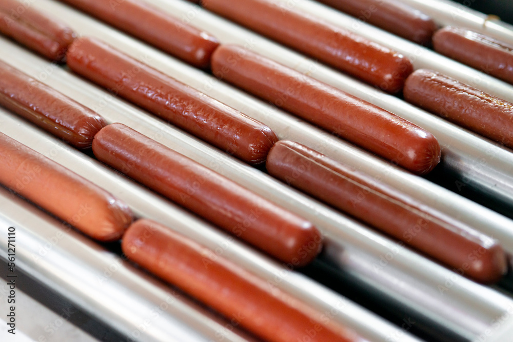 Grilling sausages on a electrical grill. Barbecue