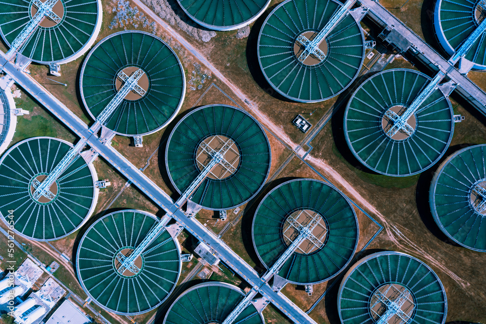 Aerial View of Drinking-Water Treatment. Microbiology of drinking water production and distribution, water treatment plant. Recirculation solid contact clarifier sedimentation tank Aerial View of Drinking-Water Treatment. Microbiology of drinking water production and distribution, water treatment plant. Recirculation solid contact clarifier sedimentation tank