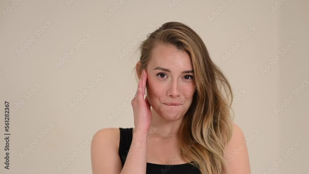 Portrait of a beautiful caucasian woman in black sportswear. Portrait of a beautiful caucasian woman in black sportswear.