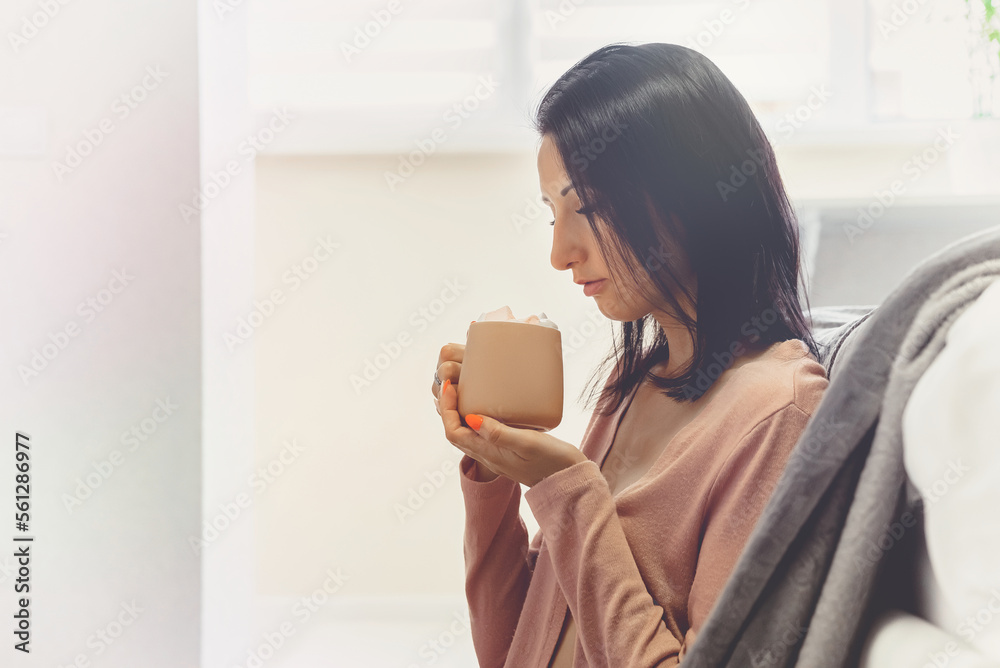 gentle romantic photo, a beautiful young woman thoughtfully drinks coca from a mug, selective focus gentle romantic photo, a beautiful young woman thoughtfully drinks coca from a mug, selective focus