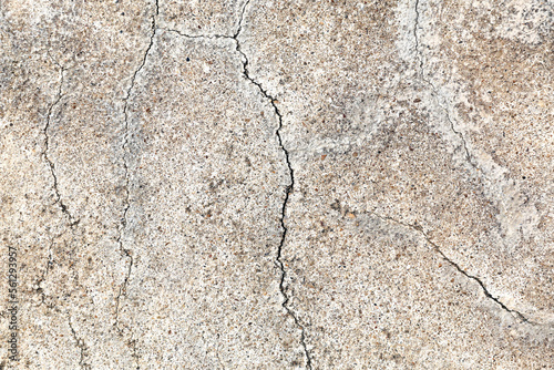 Old cement wall with crack broken and dirty for structure background and detail texture © Jintana