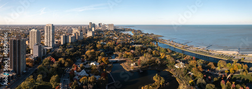 Beautiful aerial drone panorama of the Lincoln Park neighborhood overlooking the zoo and South Pond and Lagoon along the lakefront on a sunny autumn day. photo