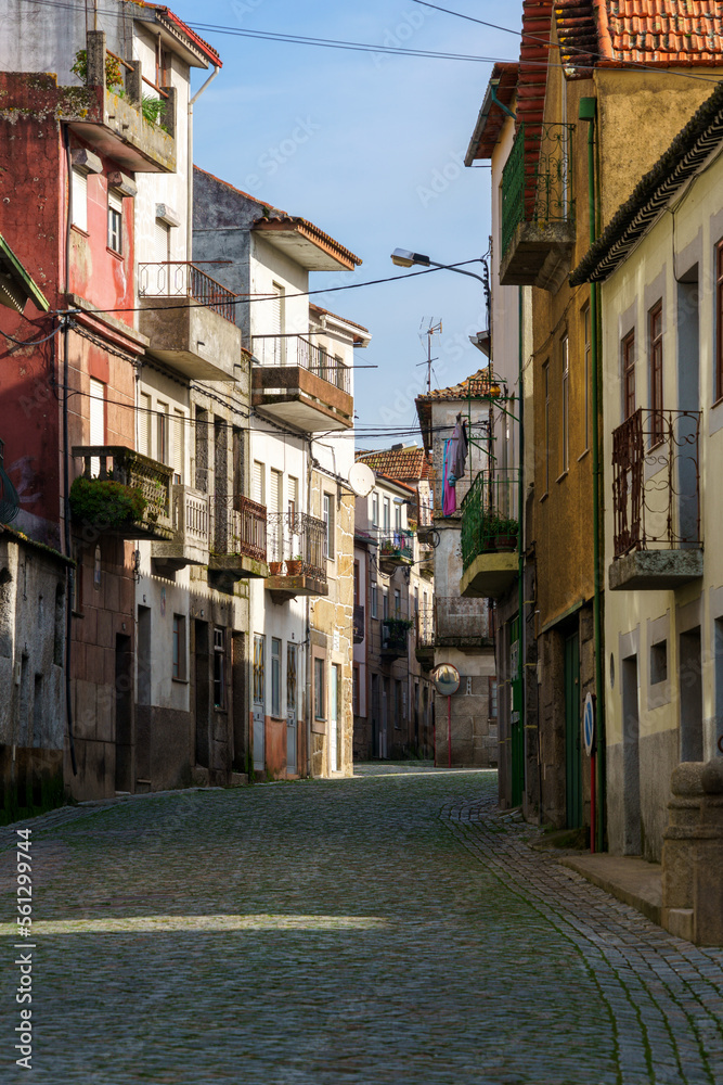 portuguese village town cobbled street with lined homes