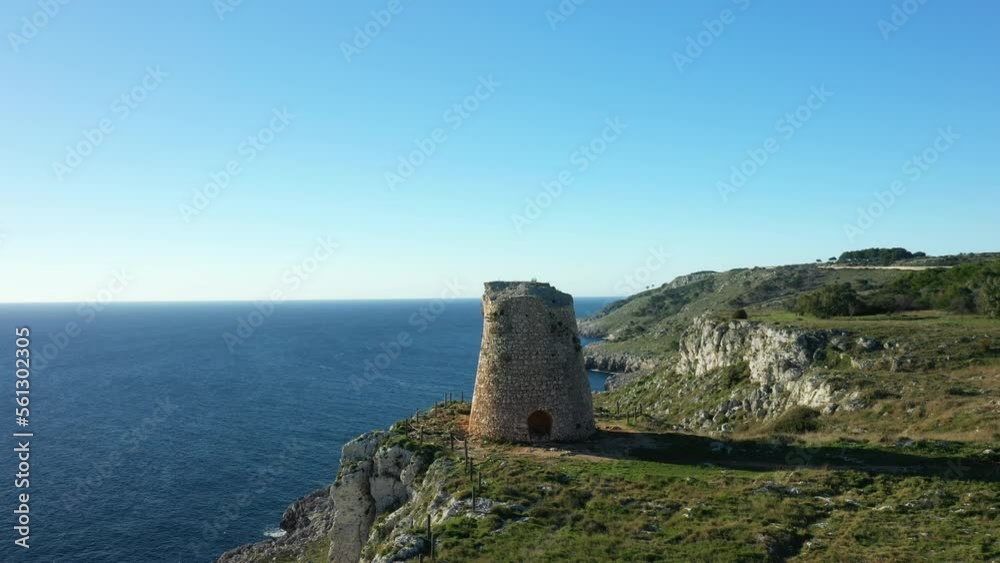 An old tower towards the village of Porto Badisco in Europe, Italy, Puglia, towards Lecce, in summer, on a sunny day.