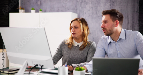 Business People Training On Computer.