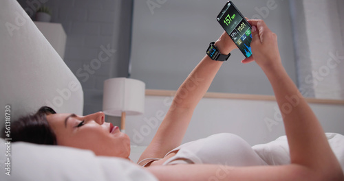 Woman's Hand Showing Heart Rate On Smart Watch