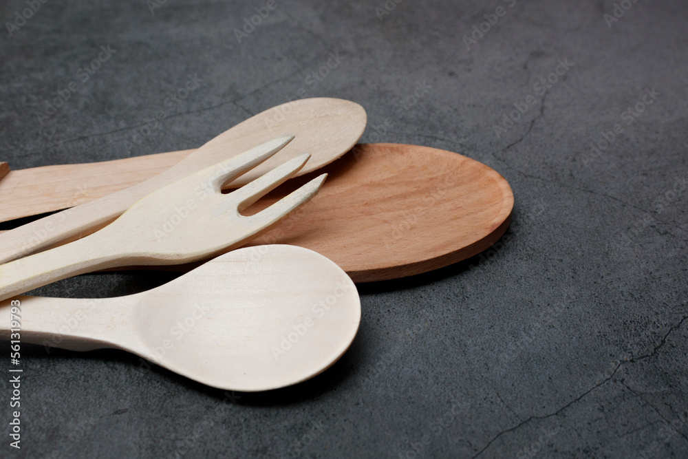 Wooden fork, spoon, spatula. wooden kitchen utensils Wooden fork, spoon, spatula. wooden kitchen utensils