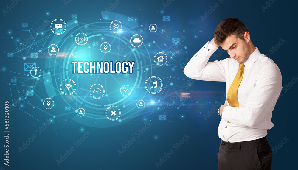 Businessman thinking about modern technology Businessman thinking about modern technology