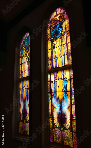 two stained glass windows in dark interior with digital artwork, AI generated artwork plus editing