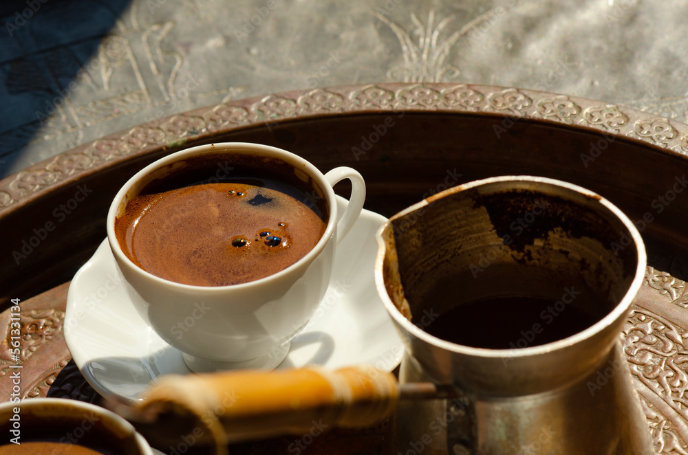 Fototapeta premium Traditional tray of Arabic or Turkish style coffee, a drink popular in the Middle East, Turkey and Balkans