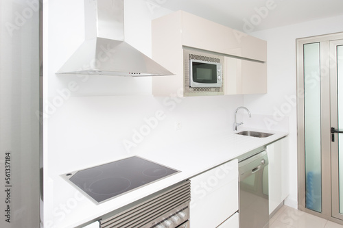 modern kitchen decorated with white appliances