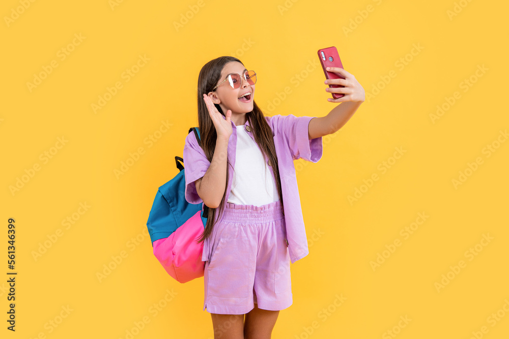amazed teen selfie school girl on background. photo of teen selfie school girl with phone. amazed teen selfie school girl on background. photo of teen selfie school girl with phone.