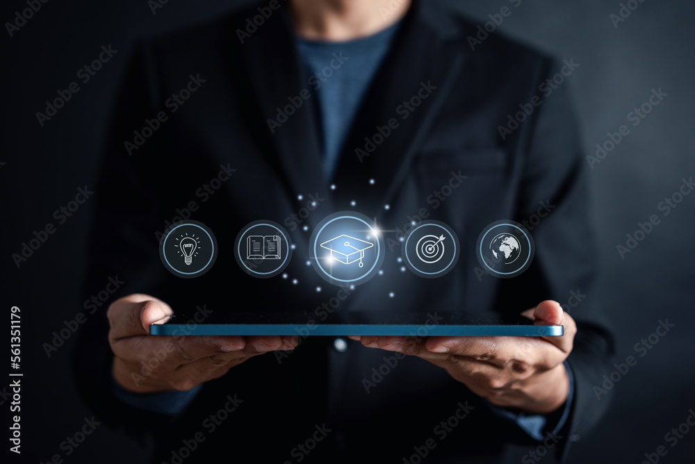 Man hand showing interface with learning educate and graduation concept ...