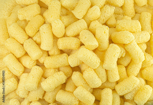 Crunchy yellow corn sticks close,top view high quality details