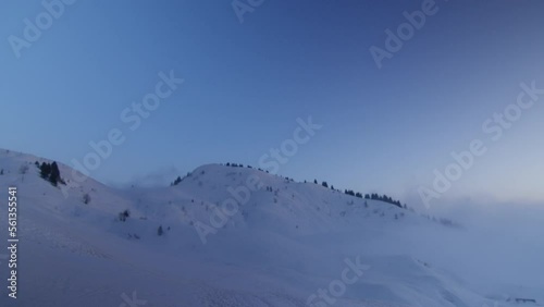 Snowy mountains at dusk in the Swiss Alps