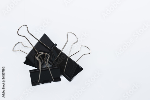 paper clips, binders on white backgrond