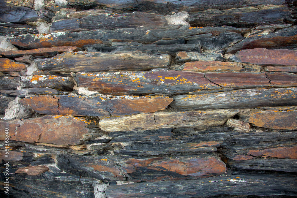 Stone rusty steel composite plates, grey-brown background Stone rusty steel composite plates, grey-brown background